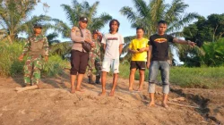 Perahu Bermuatan Sawit Karam di Sungai Belayan, Polsek Kembang Janggut Pimpin Pencarian Korban Tenggelam