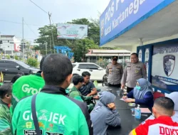 Sapa Pengemudi Ojol di Hari Buruh, Sidokkes Polres Kukar Gelar Cek Kesehatan Gratis
